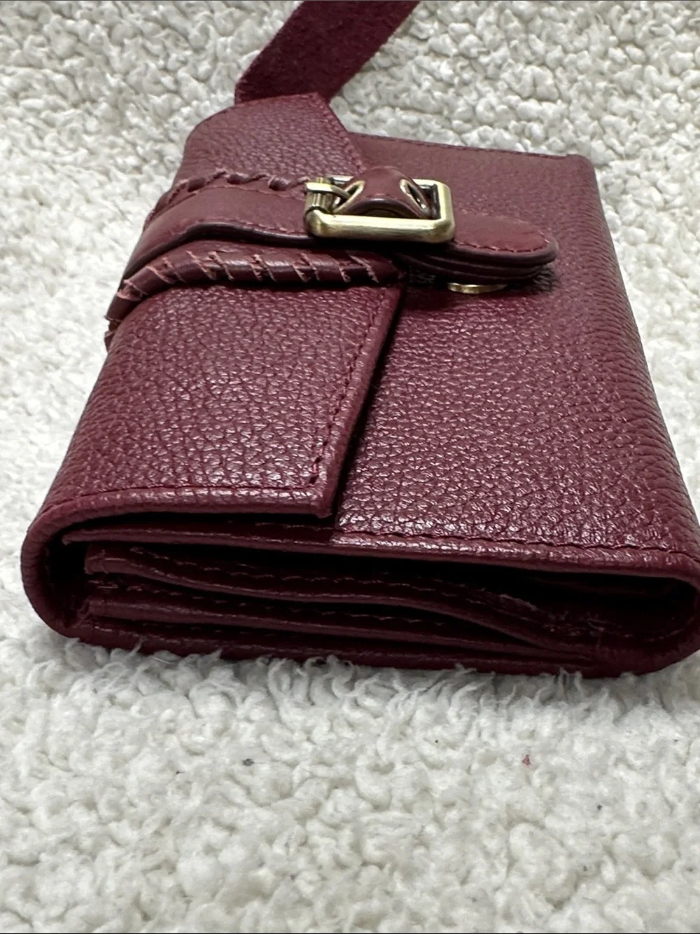 Pebbled Burgundy Genuine Leather Wallet with Buckle Strap, Whipstitch Details